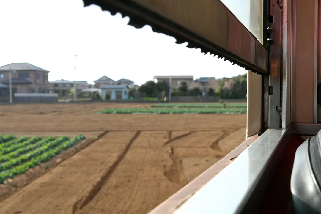 A farm seen from the train window