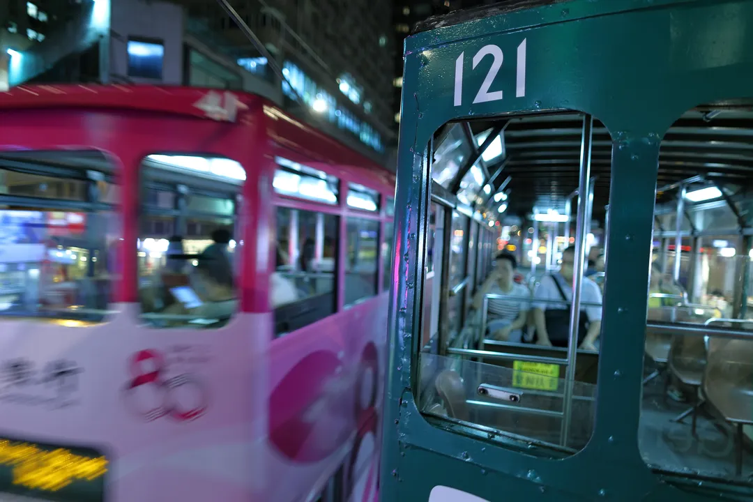 Two trams passing each other in opposite directions