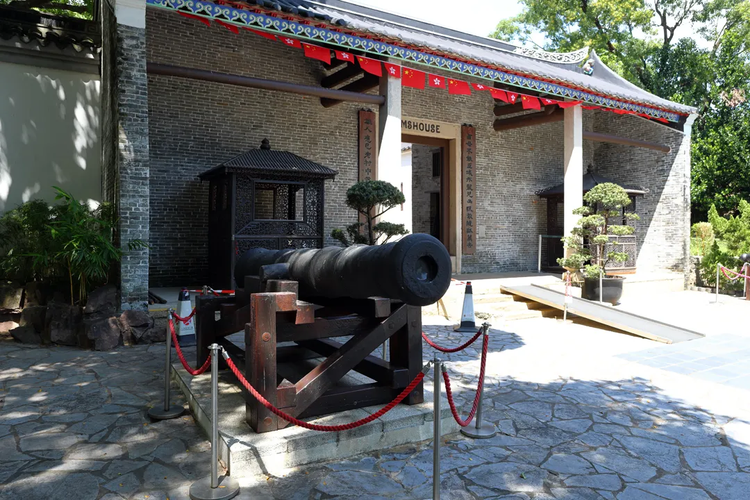 Old cannon at the main entrance of Kowloon Walled City Park